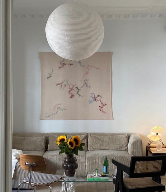 Betty - Handcrafted Wall Hanging, fully hand embroidered 130x130 cm, displayed on a living room wall.