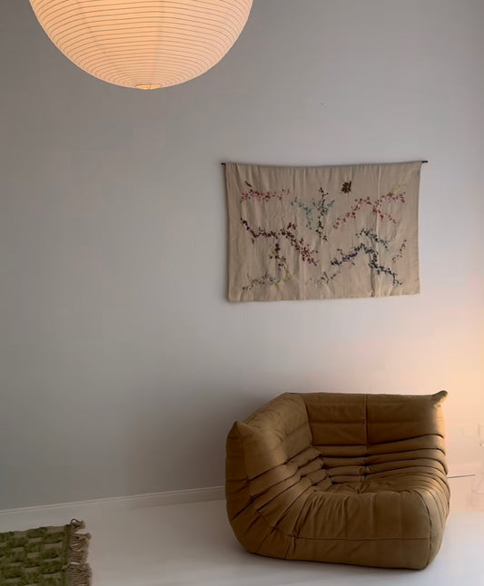 Elvira -Handcrafted Wall Hanging, hand embroidered 120x100 cm, displayed on a living room wall