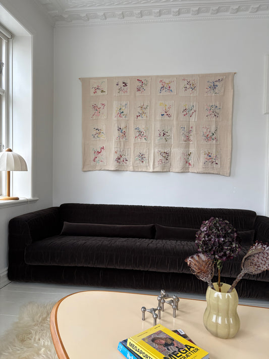 Ingrid - Handcrafted wall Hanging, fully hand embroidered 200x130 cm, displayed on a living room wall above a sofa