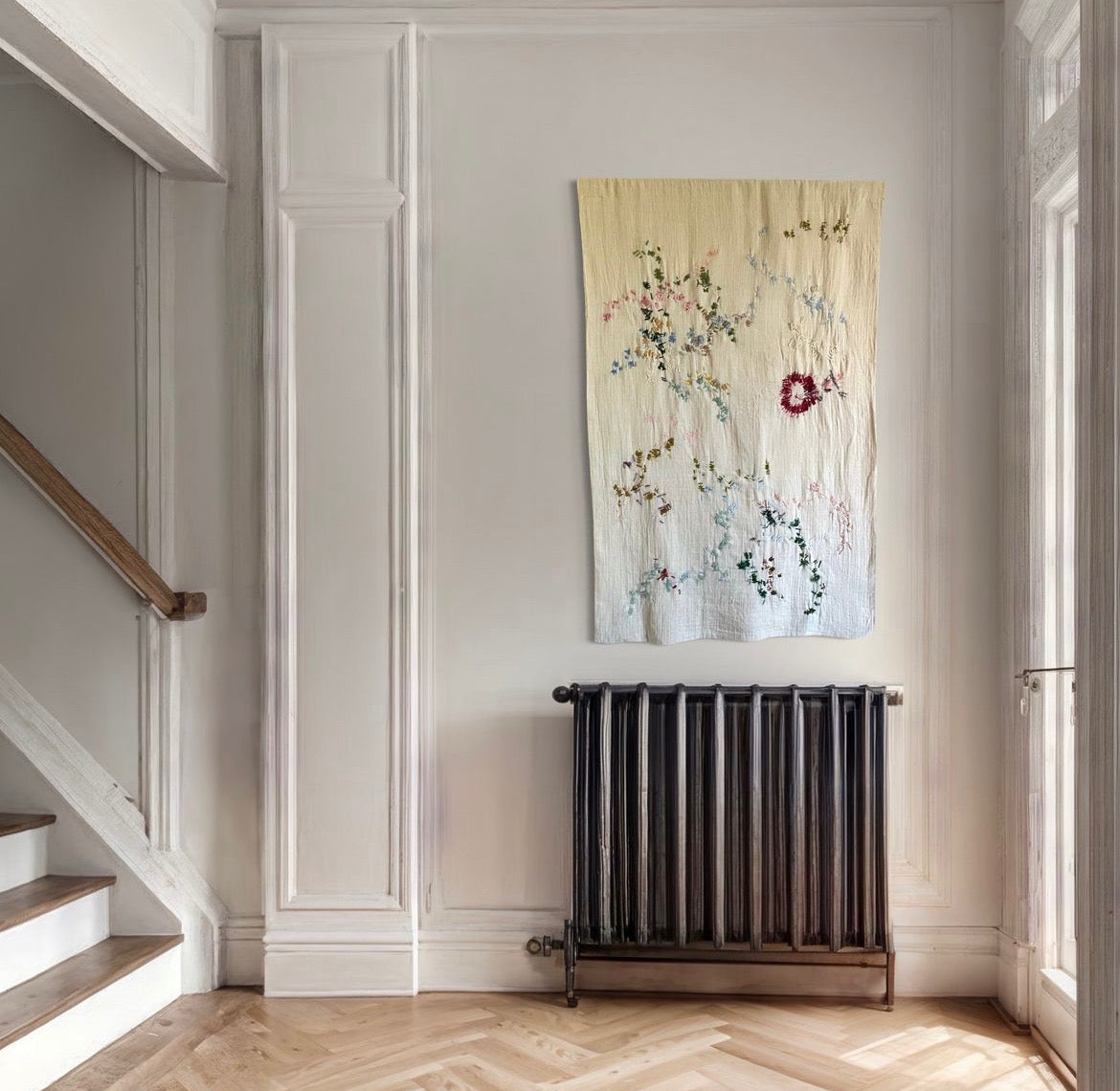 Nora - Handcrafted wall Hanging, fully hand embroiderd 70x110 cm, displayed on a entrance hall wall.
