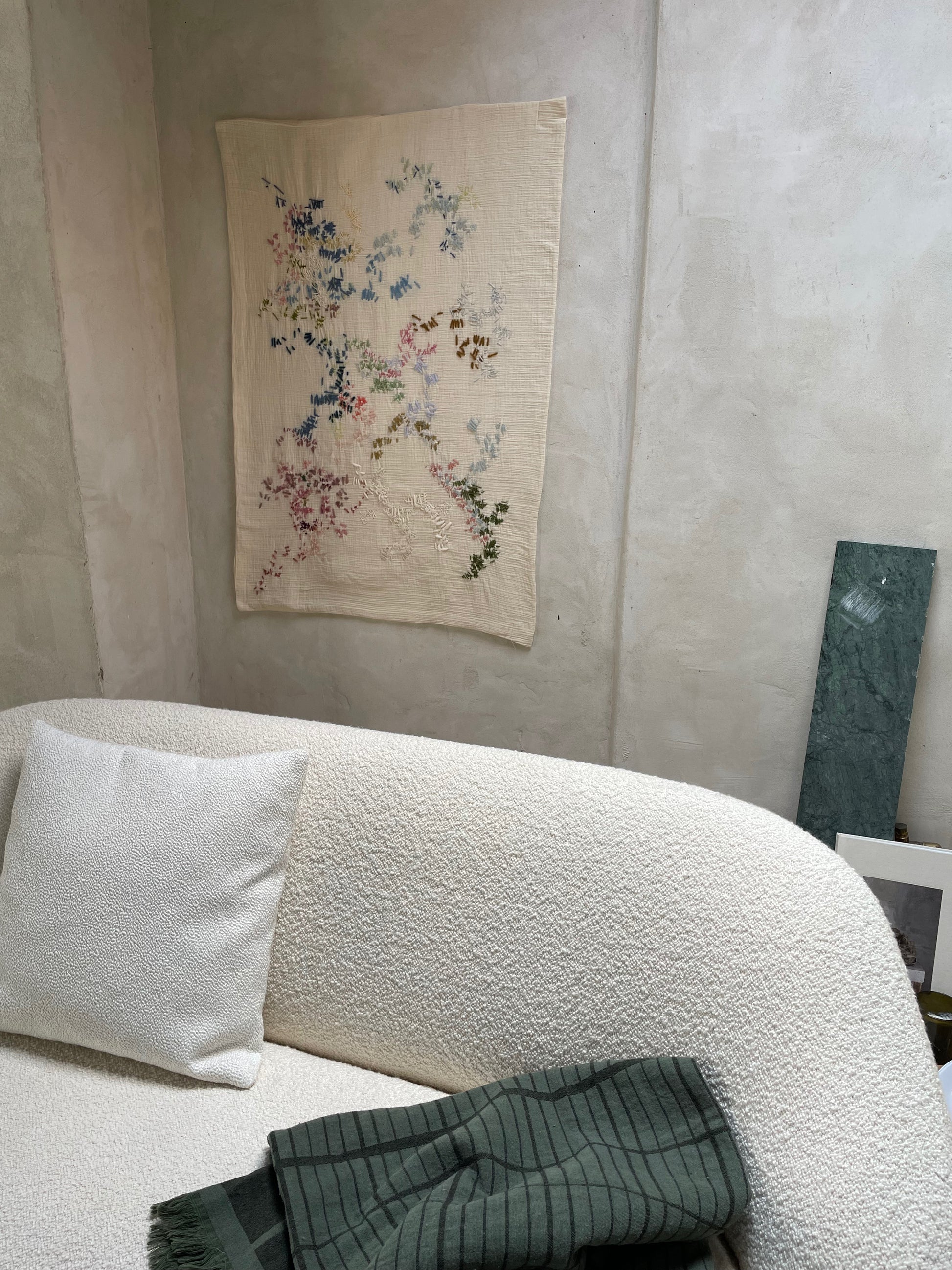 olga - handcrafted wall hanging, fully hand embroidered 100x120 cm , displayed in a living room wall