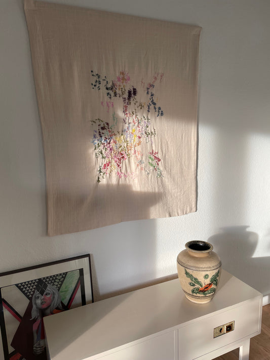 Smilla - Handcrafted Wall Hanging 90x100 cm,fully hand embroidered, displayed on a living room wall.