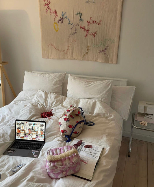 Stella - Handcrafted Wall hanging, fully hand embroidered 120x100 cm, displayed on a bedroom wall.